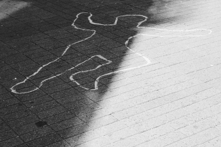 murdered person sketch on road during daytime